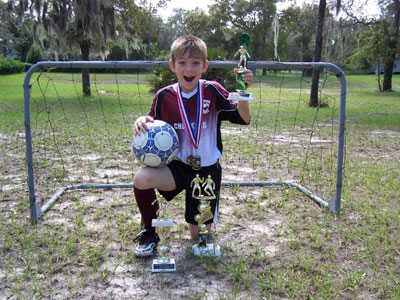 Michael Morris with his soccer accolades